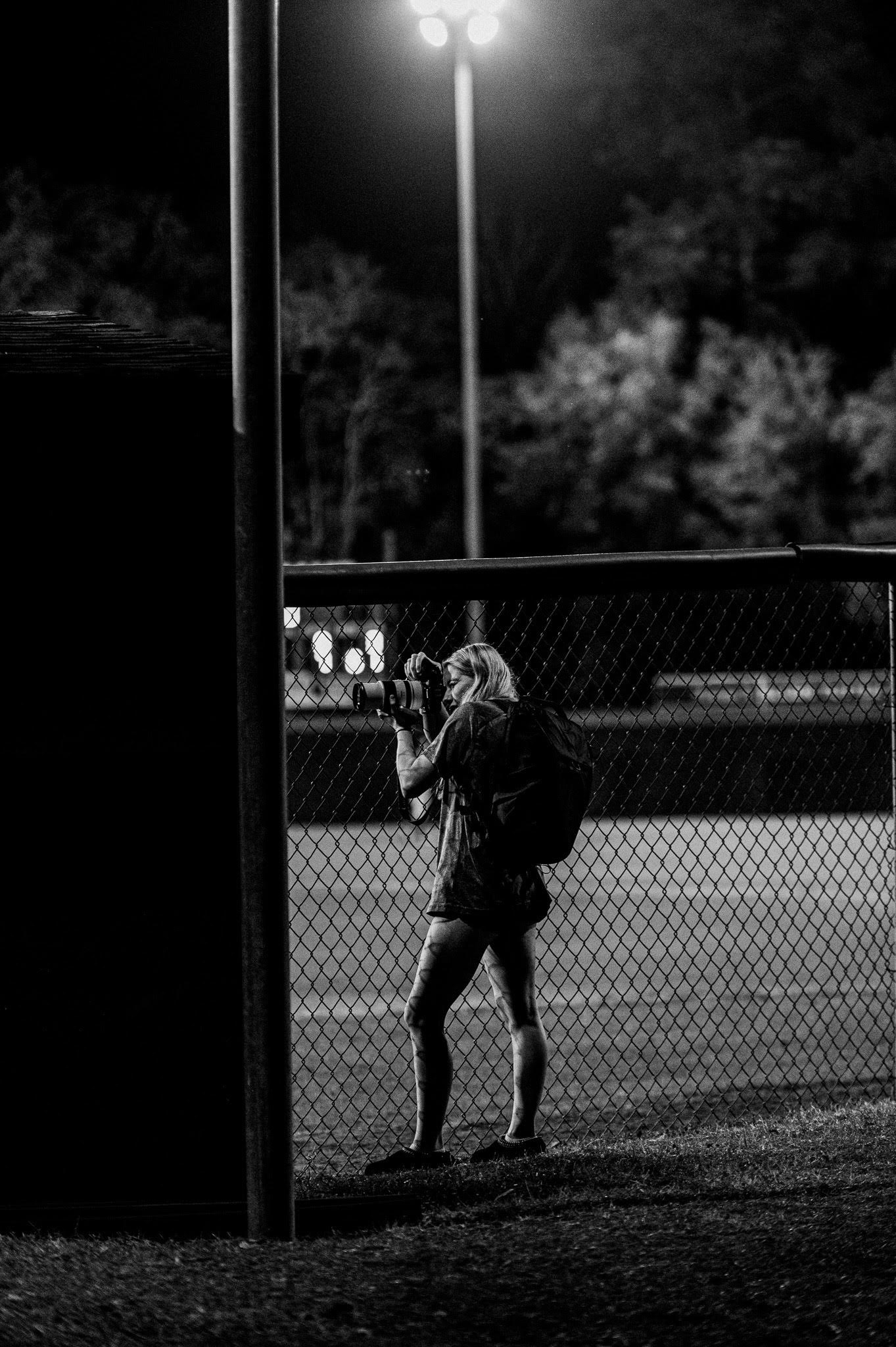 Ashlyn photographing sports
